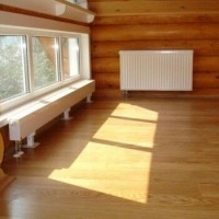 Heating in a wooden house: a comparative review of suitable systems for a wooden house