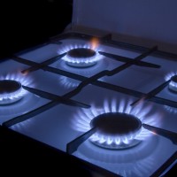 Converting a gas stove to use bottled gas: how to rearrange the nozzles to run on liquefied fuel