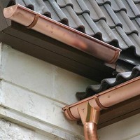 Do-it-yourself installation of metal roof gutters: analysis of technologies + installation example