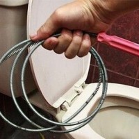 How to clean a toilet with a cable: choosing a tool and instructions on its use