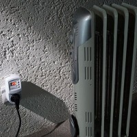 Thermostat in a socket for household heaters: types, device, selection tips