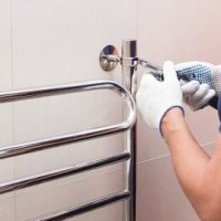 How to connect a heated towel rail to a hot water riser and a heating circuit with your own hands