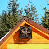 Ventilation in a wooden house: rules for providing a log house with an air exchange system