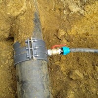 How to tap into an existing water supply system under pressure