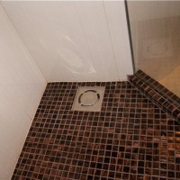 Comment réaliser une caniveau de douche dans un sol sous carrelage : guide de construction et d'installation