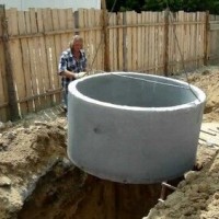 How to make a two-chamber septic tank from concrete rings: construction instructions