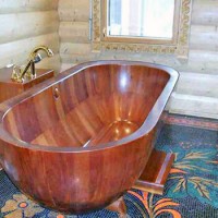 Bathroom in a wooden house: arrangement rules and finishing features