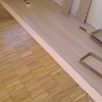 Is it possible to lay laminate flooring on old parquet: step-by-step instructions