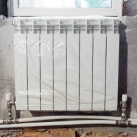 Connecting a heating radiator to a two-pipe system: choosing the optimal connection option