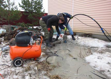 blowing out a well in a suburban area