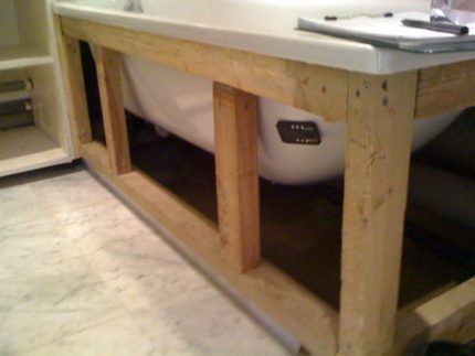 Wooden bath frame