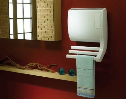 Convector with heated towel rail function