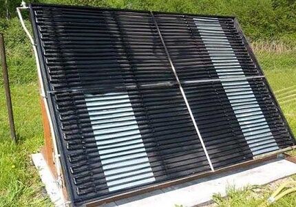 Solar heating of a private house with open collectors