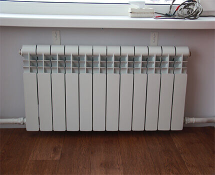 Connecting a heating radiator with a single-pipe scheme