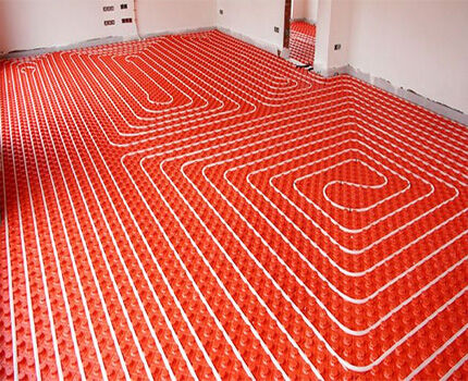 Water heated floor pipes