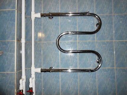 How to correctly replace a heated towel rail in a bathroom