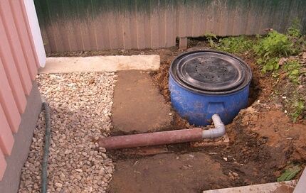 How to properly make a sewer system with a septic tank from plastic barrels