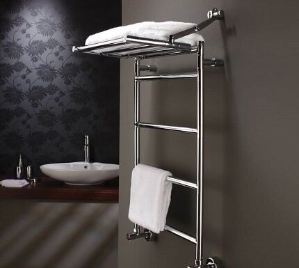 Chrome heated towel rail with linen shelf