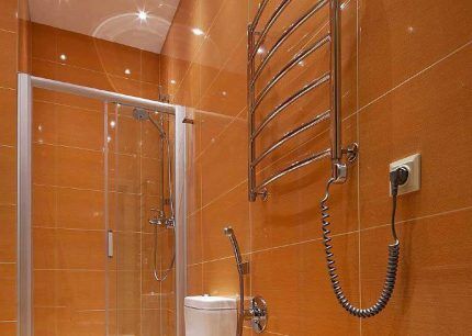 Conditions for moving a heated towel rail