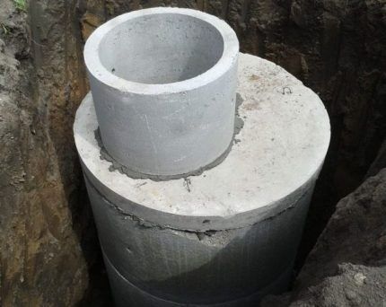 An alternative to a barrel is a cesspool made of concrete rings