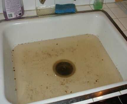 Sink flooded with drainage