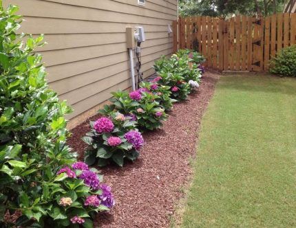 Flowerbed on top of drainage system