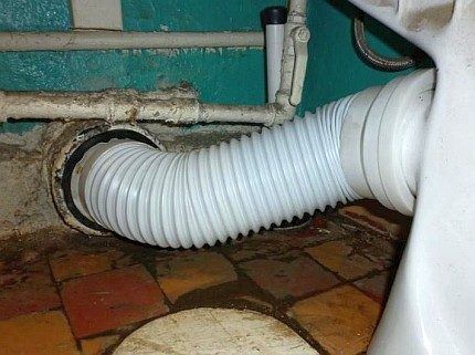 Corrugated pipe with a toilet connected