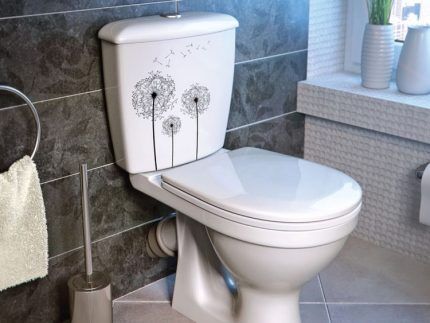 Toilet with oblique outlet