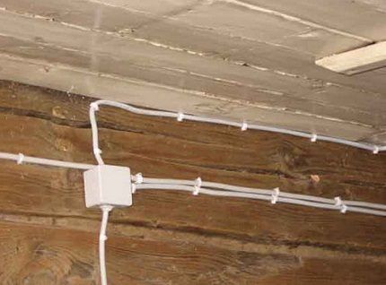 Securing electrical cables to brackets