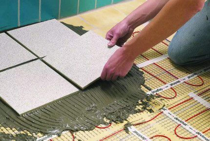 Laying tiles on heated floors