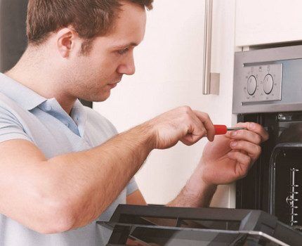 Gasman installing stove