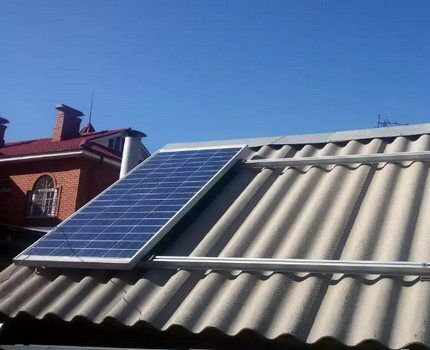 Solar panel on slate roof