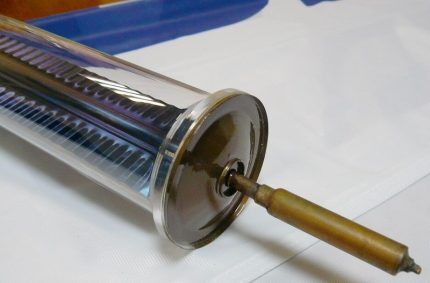 Vacuum feather tube