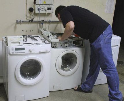 Foreman inspects washing machines