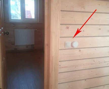 Wireless switch on a wooden wall