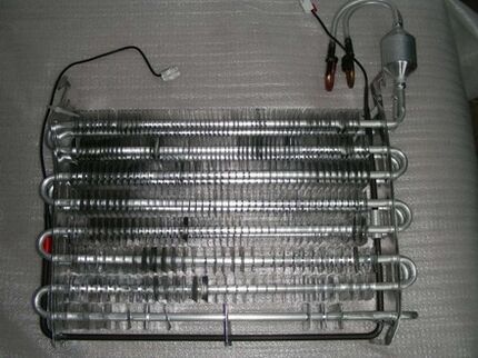Compression device evaporator
