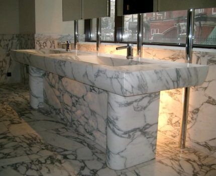 Bathroom and washbasin made of natural stone