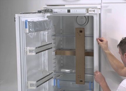 Repairing a sagging refrigerator door