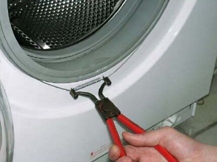 Removing the washing machine cuff