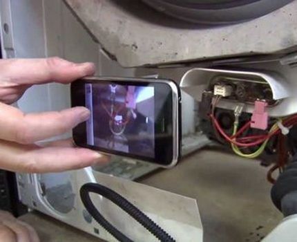 Filming the disassembly process on your phone