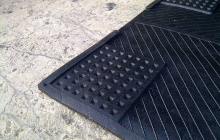 Tapis anti-vibration pour machine à laver