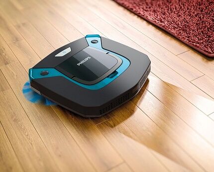 Robotic vacuum cleaner with wet wipe