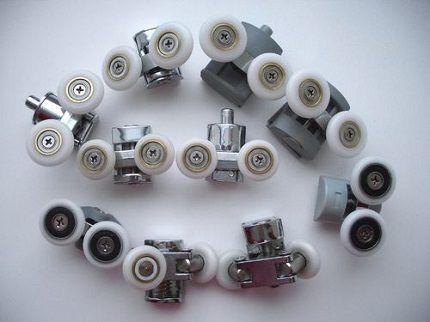 Standard rollers for shower enclosures