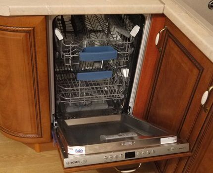 The dishwasher is built into the floor section