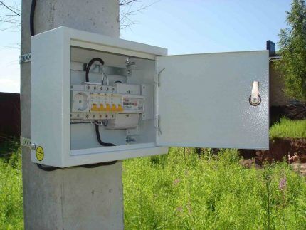 Metal electrical cabinet on a pole