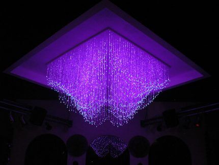 Decorative decoration of the ceiling with fiber optic threads