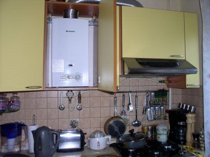 Gas water heater in the kitchen interior