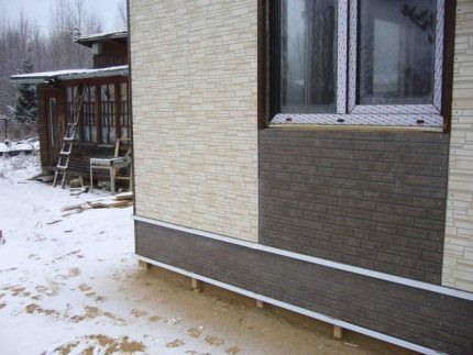 Cladding a house with fiber cement panels
