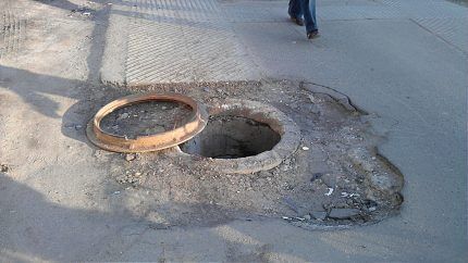 Open sewer well on the road