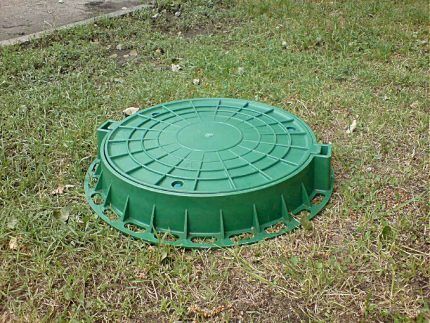 Green plastic hatch on the ground